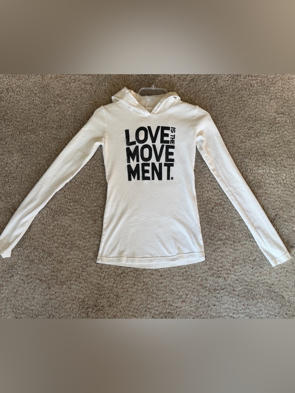 White Long Sleeve Hooded Tee with 'Love is the Movement' Graphic